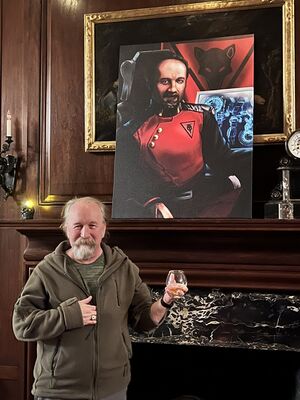 Michael Stackpole with Gus Michaels portrait.jpg